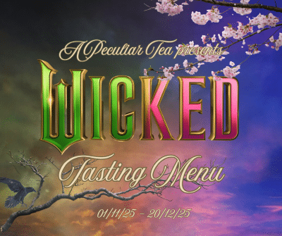 Wicked font with pink, green and purple background